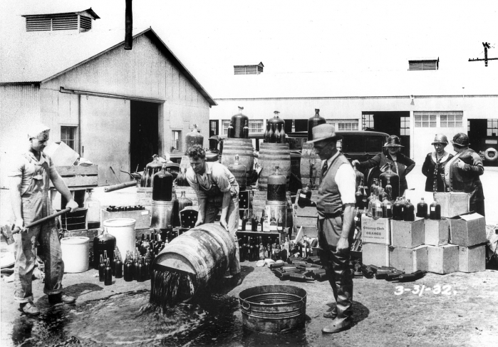 orange_county_sheriffs_deputies_dumping_illegal_booze_santa_ana_3-31-1932