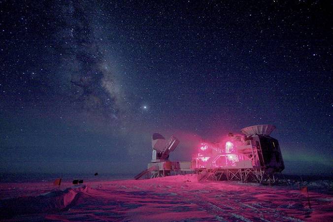 The 10-m (32.8 ft) South Pole Telescope and the BICEP (Background Imaging of Cosmic Extragalactic Polarization) Telescope at Amundsen-Scott South Pole Station is seen against the night sky with the Milky Way in this National Science Foundation picture taken in August 2008. Astronomers announced on March 17, 2014 that they had discovered what many consider the holy grail of their field: ripples in the fabric of space-time that are echoes of the massive expansion of the universe that took place just after the Big Bang. The gravitational waves were detected by the BICEP telescope. REUTERS/Keith Vanderlinde/National Science Foundation/Handout (ANTARCTICA - Tags: SCIENCE TECHNOLOGY TPX IMAGES OF THE DAY ENVIRONMENT) ATTENTION EDITORS - IMAGE HAS BEEN SUPPLIED BY A THIRD PARTY. IT IS DISTRIBUTED, EXACTLY AS RECEIVED BY REUTERS, AS A SERVICE TO CLIENTS. FOR EDITORIAL USE ONLY. NOT FOR SALE FOR MARKETING OR ADVERTISING CAMPAIGNS - RTR3HGWY