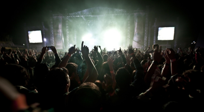 Crowd dancing at a music festival