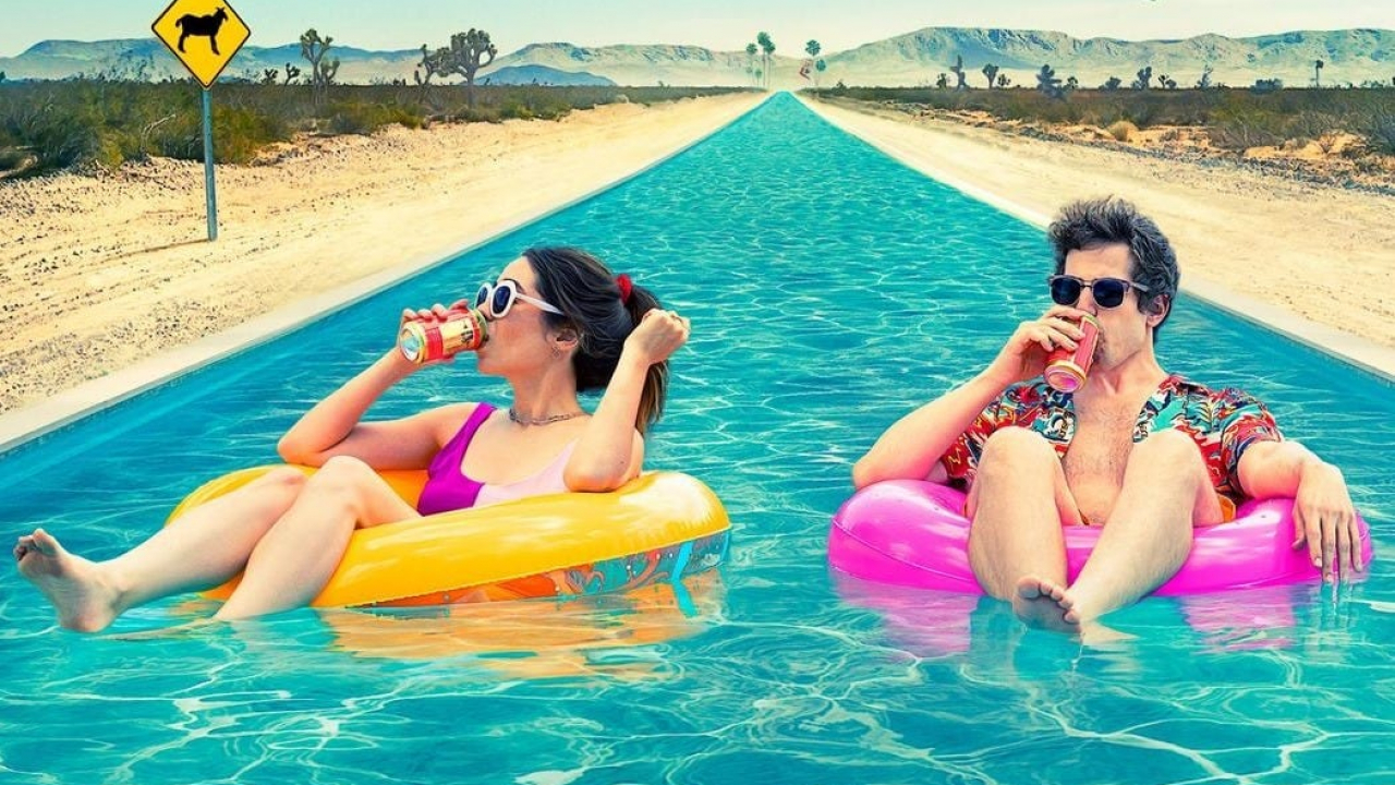 Palm Springs, il regista: “Grazie a Jurassic Park i dinosauri per me rappresentano l’amore”
