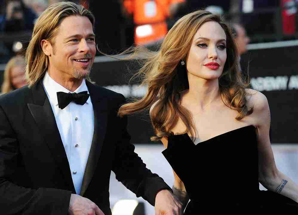 Brad Pitt, Angelina Jolie e il figlio Maddox contro il padre