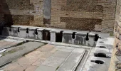 Antichi Romani: cosa facevano nei bagni pubblici?