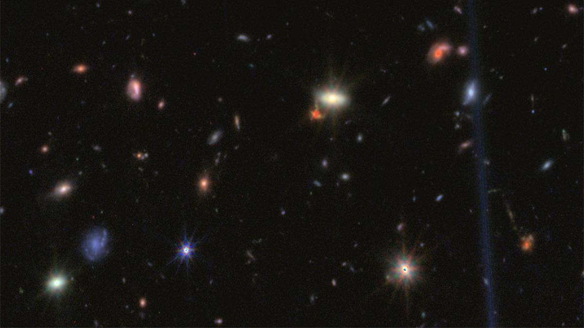 Puntini rossi nel cosmo primordiale: nuove analisi indicano un’origine inattesa e affascinante